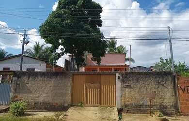 Imagem: A casa possui 2 Dormitórios, 2 Banheiros, 3 Vagas na garagem