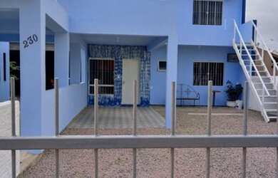 Imagem: A casa possui 2 Dormitórios, 2 Vagas na garagem e está localizado