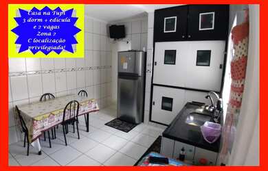 Imagem: A casa possui 3 Dormitórios, 2 Banheiros, 2 Vagas na garagem