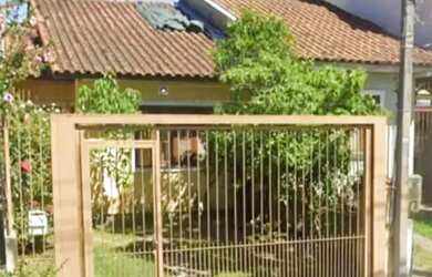 Imagem: A casa possui 2 Dormitórios, 1 Banheiro, 1 Vaga na garagem