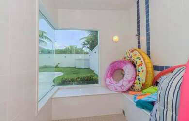 Imagem 10: Casa de condomínio para venda possui 700 metros quadrados com 5 quartos