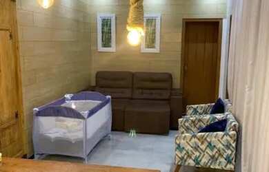 Imagem: A casa possui 2 Dormitórios, 1 Banheiro, 2 Vagas na garagem