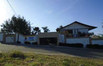 Imagem: A casa possui 5 Dormitórios, 4 Banheiros, 5 Vagas na garagem