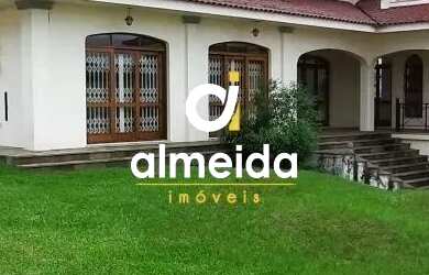 Imagem: A casa possui 5 Dormitórios, 5 Banheiros, 5 Vagas na garagem