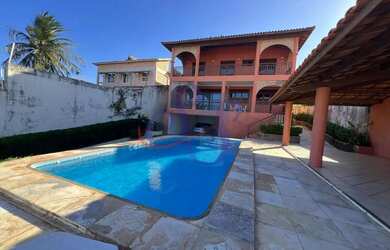 Imagem: A casa possui 5 Dormitórios, 5 Banheiros, 5 Vagas na garagem