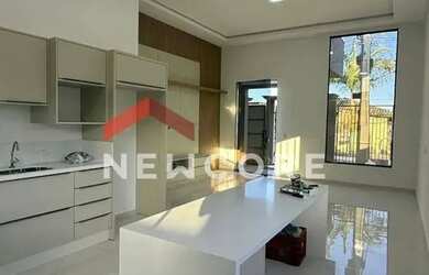 Imagem: A casa possui 2 Dormitórios, 3 Banheiros, 2 Vagas na garagem