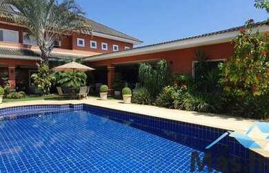 Imagem: A casa em condomínio possui 4 Dormitórios, 5 Banheiros, 4