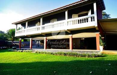 Imagem: A casa possui 5 Dormitórios, 5 Banheiros, 5 Vagas na garagem