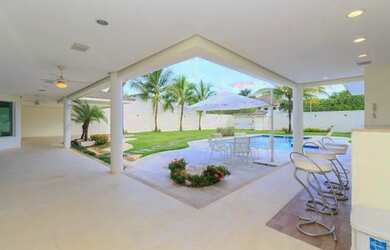 Imagem 7: Casa de condomínio para venda possui 700 metros quadrados com 5 quartos