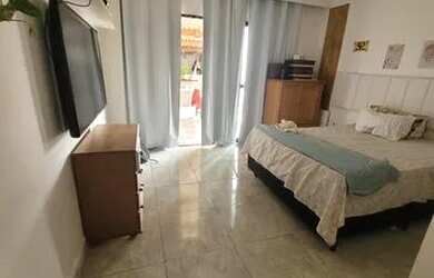 Imagem: A casa possui 5 Dormitórios, 5 Banheiros, 2 Vagas na garagem