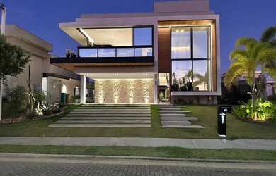 Imagem: A casa em condomínio possui 4 Dormitórios, 5 Banheiros, 4