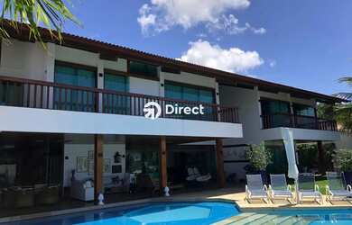 Imagem: A casa possui 4 Dormitórios, 5 Banheiros, 5 Vagas na garagem