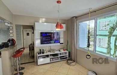 Imagem: O apartamento possui 3 Dormitórios, 1 Banheiro, 2 Vagas na