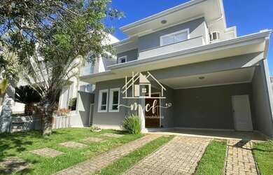 Imagem: A casa possui 3 Dormitórios, 5 Banheiros, 4 Vagas na garagem