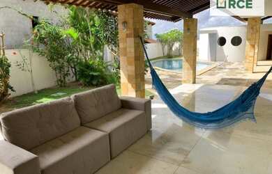 Imagem: A casa em condomínio possui 5 Dormitórios, 5 Banheiros, 2