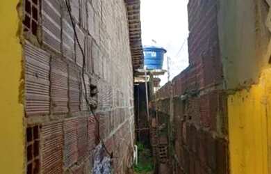 Imagem: A casa possui 3 Dormitórios, 2 Banheiros, 3 Vagas na garagem