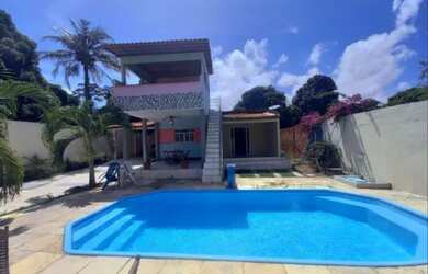 Imagem: A casa possui 1 Dormitório, 3 Vagas na garagem e está localizado