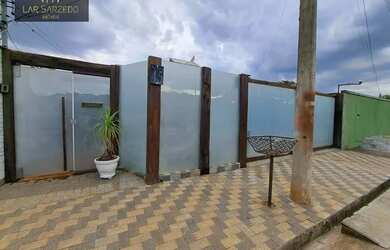 Imagem: A casa possui 3 Dormitórios, 3 Banheiros, 2 Vagas na garagem