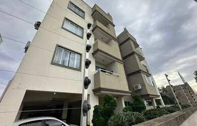 Imagem: O apartamento possui 2 Dormitórios, 1 Banheiro, 2 Vagas na