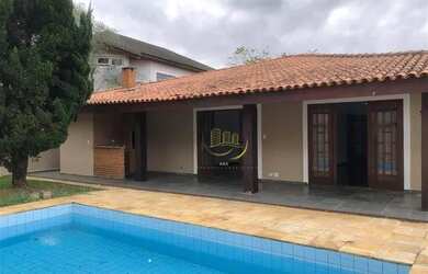 Imagem: A casa em condomínio possui 3 Dormitórios, 3 Banheiros, 289m²