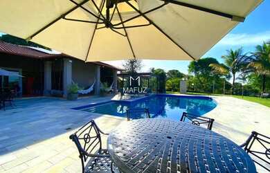 Imagem: A casa possui 5 Dormitórios, 5 Banheiros, 5 Vagas na garagem