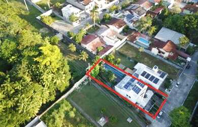 Imagem: A casa em condomínio possui 4 Dormitórios, 4 Banheiros, 4