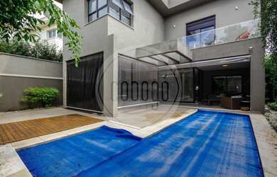 Imagem: A casa em condomínio possui 4 Dormitórios, 5 Banheiros, 4