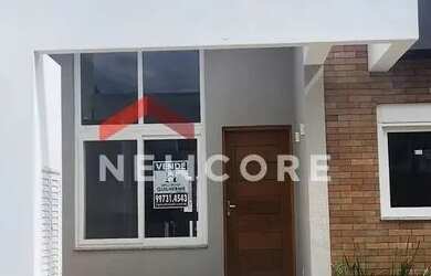 Imagem: A casa possui 3 Dormitórios, 2 Banheiros, 2 Vagas na garagem