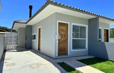 Imagem: A casa possui 2 Dormitórios, 1 Banheiro, 2 Vagas na garagem