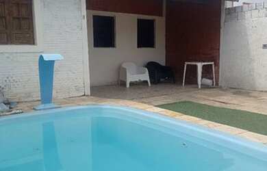 Imagem: A casa possui 2 Dormitórios, 1 Vaga na garagem e está localizado