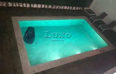 Imagem: A casa em condomínio possui 5 Dormitórios, 5 Banheiros, 5