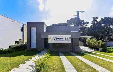 Imagem: A casa em condomínio possui 4 Dormitórios, 5 Banheiros, 4