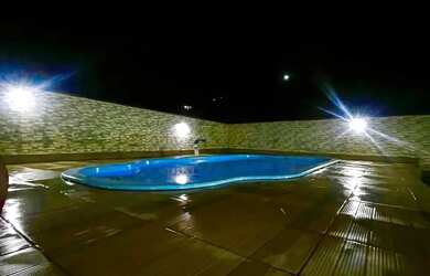 Imagem: A casa possui 3 Dormitórios, 3 Banheiros, 2 Vagas na garagem