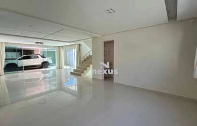 Imagem: A casa possui 4 Dormitórios, 5 Banheiros, 5 Vagas na garagem