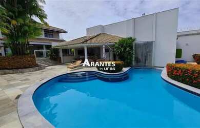 Imagem: A casa à venda possui 4 Dormitórios, 5 Banheiros, 4 Vagas