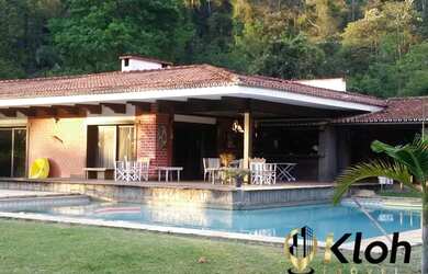 Imagem: A casa possui 5 Dormitórios, 5 Banheiros, 5 Vagas na garagem