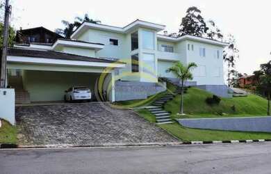 Imagem: A casa em condomínio possui 5 Dormitórios, 5 Banheiros, 5