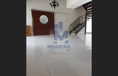 Imagem: A casa possui 3 Dormitórios, 5 Banheiros, 4 Vagas na garagem