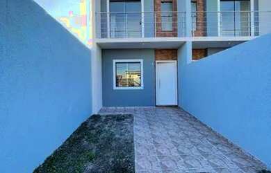 Imagem: A casa possui 3 Dormitórios, 1 Banheiro, 2 Vagas na garagem