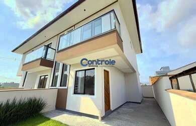 Imagem: A casa possui 2 Dormitórios, 3 Banheiros, 1 Vaga na garagem