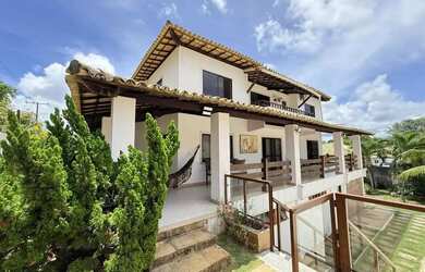 Imagem: A casa possui 5 Dormitórios, 5 Banheiros, 4 Vagas na garagem