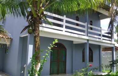 Imagem: A casa possui 5 Dormitórios, 4 Banheiros, 4 Vagas na garagem