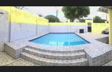 Imagem: A casa possui 3 Dormitórios, 4 Vagas na garagem e está localizado