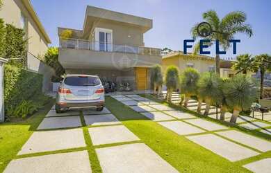 Imagem: A casa em condomínio para alugar possui 4 Dormitórios, 5 Banheiros