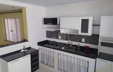 Imagem: A casa possui 4 Dormitórios, 3 Banheiros, 110m² de Área e