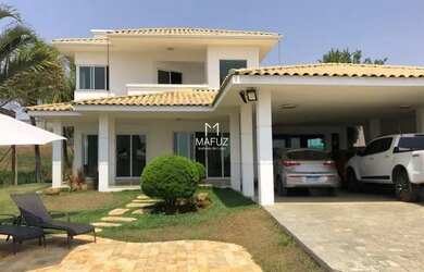 Imagem: A casa possui 5 Dormitórios, 5 Banheiros, 5 Vagas na garagem