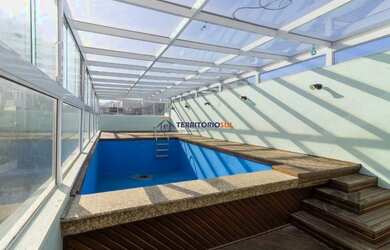 Imagem: A casa possui 4 Dormitórios, 4 Banheiros, 2 Vagas na garagem