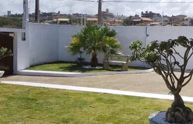 Imagem: A casa possui 4 Dormitórios, 4 Banheiros, 5 Vagas na garagem