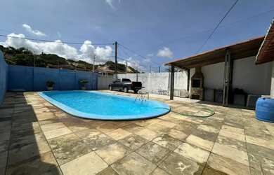 Imagem: A casa possui 3 Dormitórios, 3 Banheiros, 3 Vagas na garagem