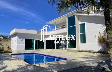 Imagem: A casa possui 4 Dormitórios, 4 Banheiros, 3 Vagas na garagem